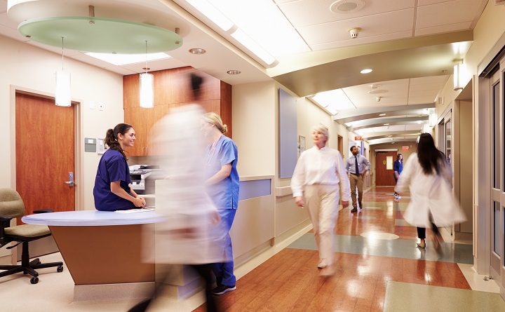 Busy Nurse's Station In Modern Hospital